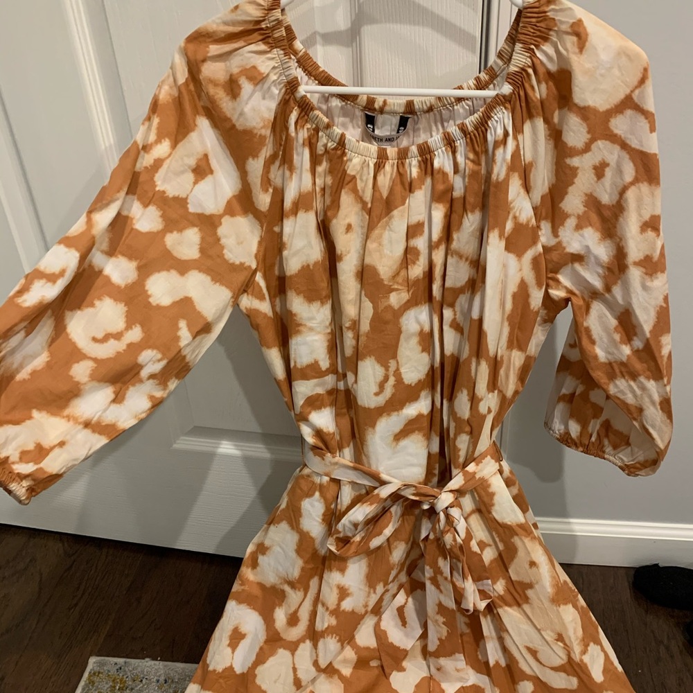 Elizabeth and James orange and white dress